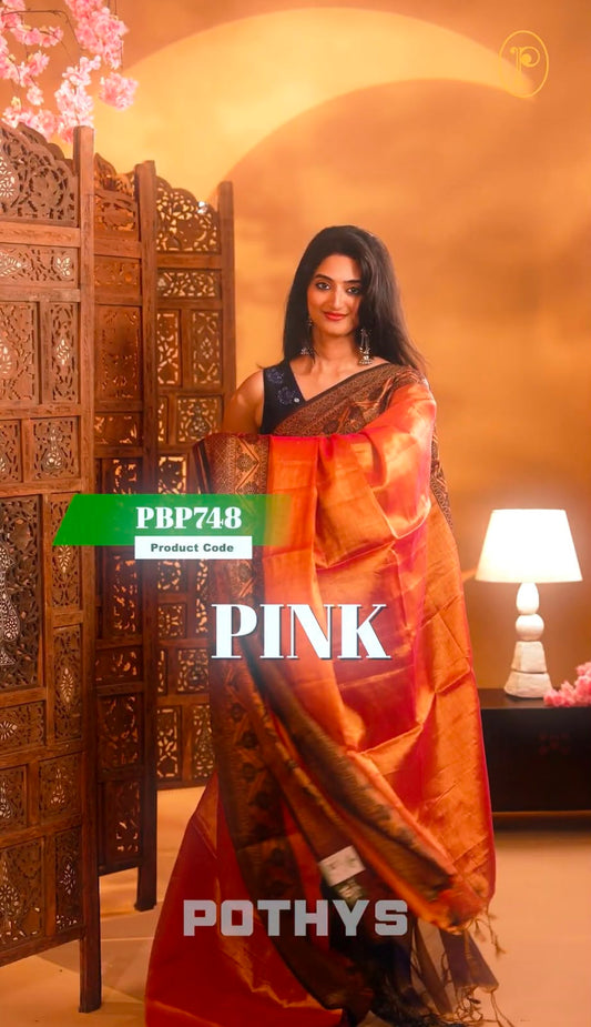Pink Colour Semi-Tissue Saree with a plain body and intricate thread work border.