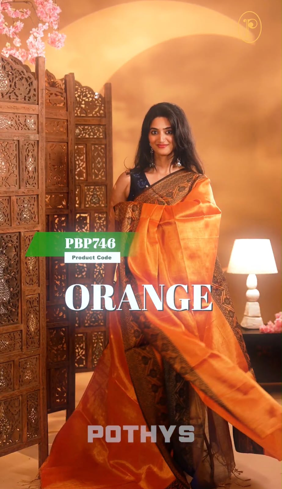 Orange  Colour Semi-Tissue Saree with a plain body and intricate thread work border.
