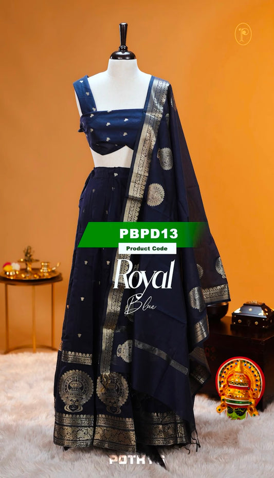 Royal Blue colour Chanderi Silk semi stitched Dhavani Set featuring beautiful Buttas on skirt With Kathakali Design border, same material dupatta with Same design & blouse.
