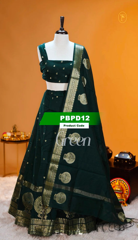 Green colour Chanderi Silk semi stitched Dhavani Set featuring beautiful Buttas on skirt With Kathakali Design border, same material dupatta with Same design & blouse.