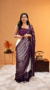 Violet colour Georgette Dhavani material featuring white skirt with Check pattern & border, Small floral work on blouse piece, same colour dupatta with strips.
