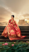 Regal Red Kanchipuram Samudrika Pattu saree with gold zari Padmanabhaswamy Temple East Gopuram weave on border and pallu, featuring Anantha Sayanam motif and blouse. Kanchipuram silk creation by Pothys Kerala, marking 15 years of Pothys Thiruvananthapuram