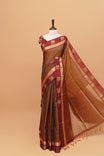 Brown colour silk cotton saree featuring  copper zari Check motifs on body ,contrast maroon with copper zari motifs on border & pallu, comes with matching blouse piece