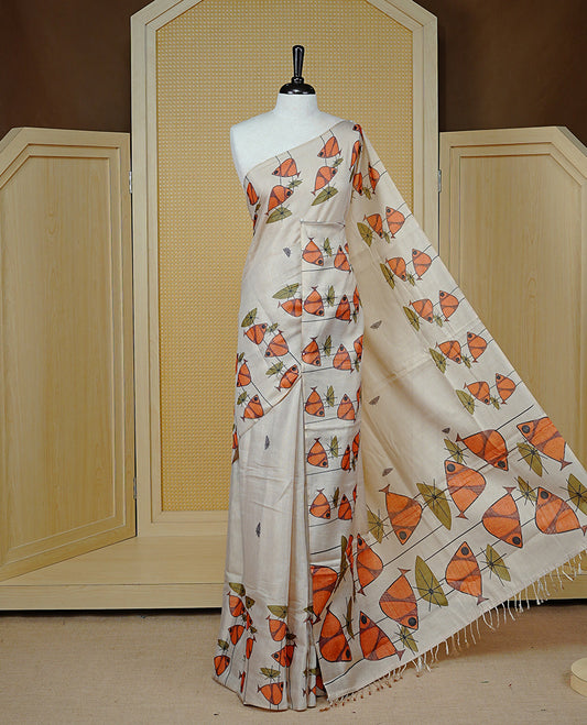 Light Gold colour semi tissue silk saree featuring Digital Fish print motifs on body and border, paired with matching blouse piece.