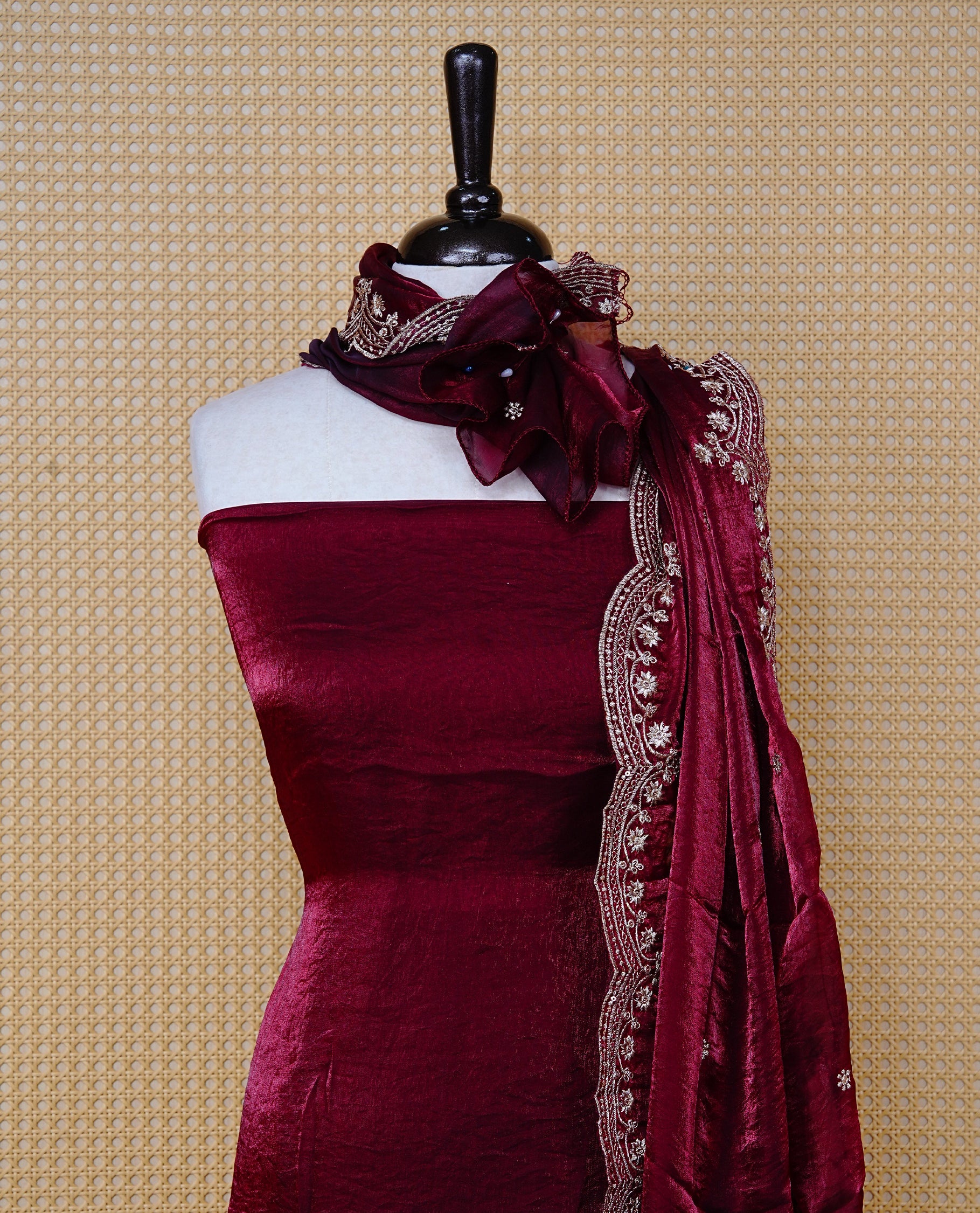 Maroon colour Fendy silk salwar material With Elegant plain body with lining, Comes with santoon bottom, Fendy silk dupatta With Floral buttas & Scalp Border.