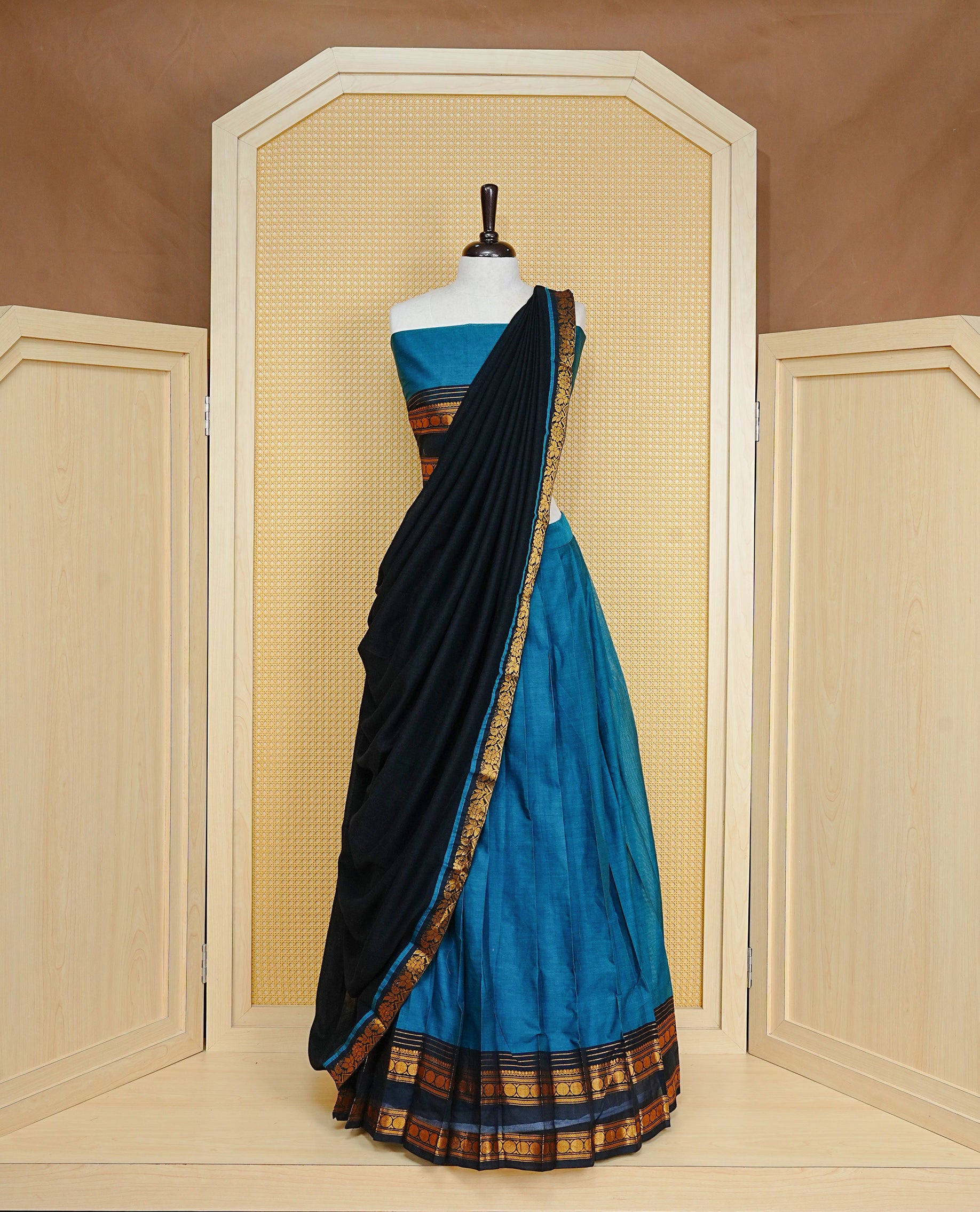 Teal colour Semi Stitched Dhavni set Featuring Teal Skirt With Contrast Black colour with Zari border, paired with UnStitched Blouse & Elegant Dupatta.