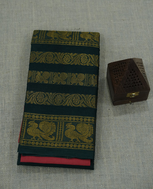 Green colour saree featuring rich gold woven motifs and traditional borders.