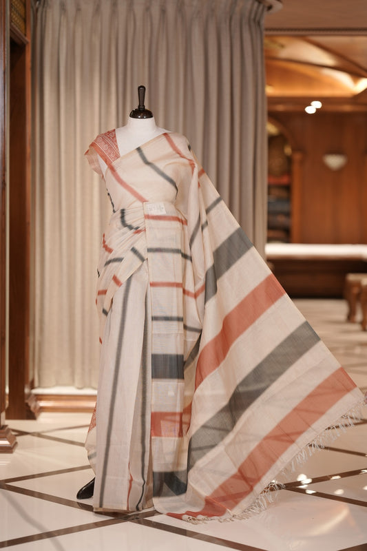 Brown & Black colour Linen printed saree featuring stylish fancy line prints all over, paired with a contrast colour printed blouse and a beautifully designed fancy line pallu.