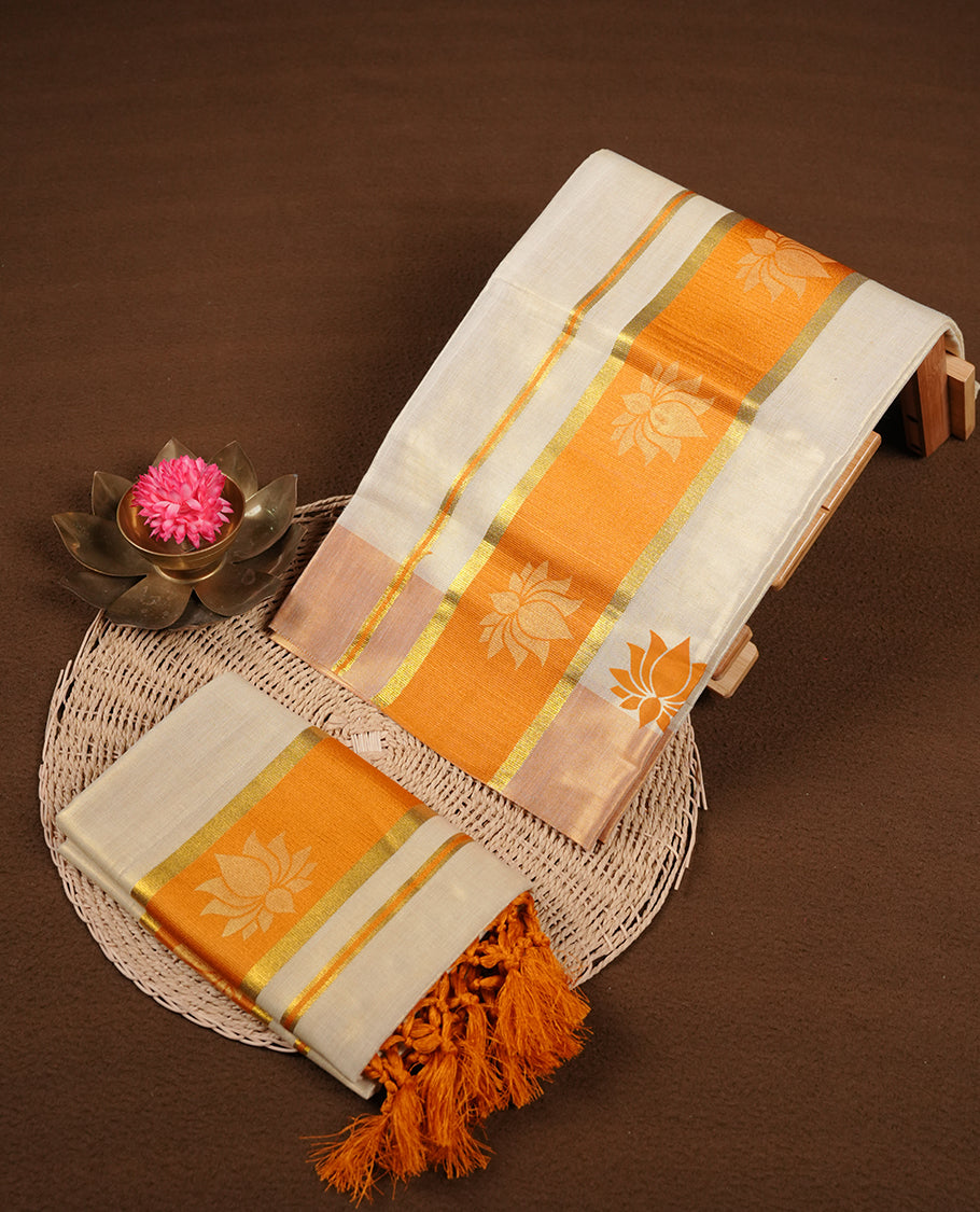 Light gold colour tissue set mundu highlights gold and orange zari border featuring gold lotus motifs across border (2.00/2.80 MTS).