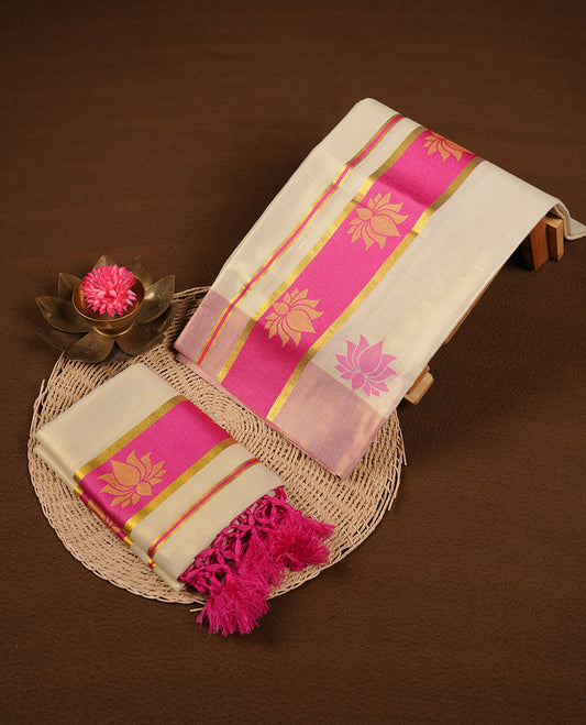 Light gold colour tissue set mundu highlights gold and pink zari border featuring gold lotus motifs across border (2.00/2.80 MTS). (Copy)