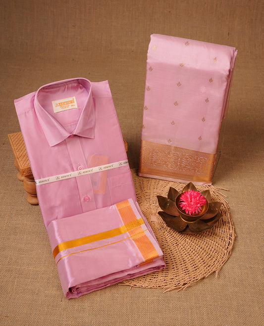 Pink colour shirt and dhoti with gold colour border, paired with matching colour silk saree featuring gold zari buttas and traditional border paired with matching blouse piece.