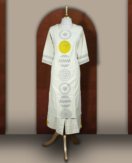 Cream colour cotton coord set with bold geometric prints and a pop of yellow, Features a round neck kurta with 3/4th sleeves and matching straight pants.
