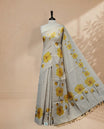 Butter Cream colour Linen Tissue Saree featuring Yellow colour small & Big floral printed border, Comes with Contrast Self Printed Blouse.