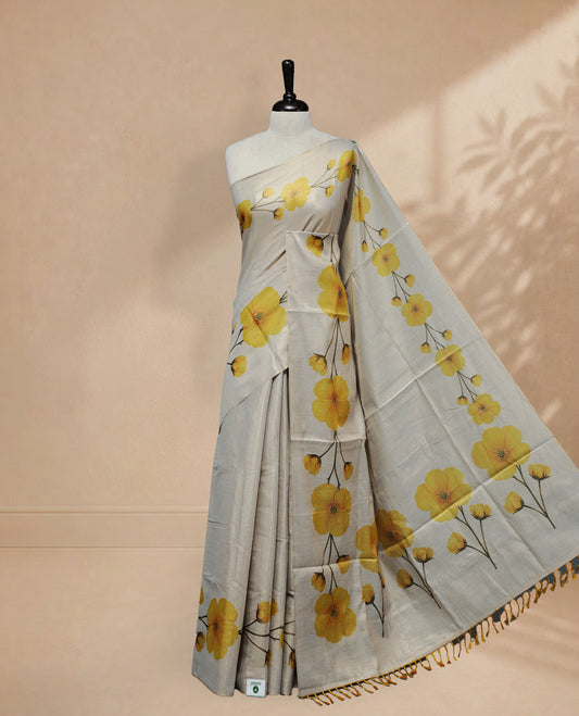 Butter Cream colour Linen Tissue Saree featuring Yellow colour small & Big floral printed border, Comes with Contrast Self Printed Blouse.