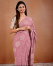Light Onion Pink colour vijithra silk saree featuring small zari details on body, Tree design border.