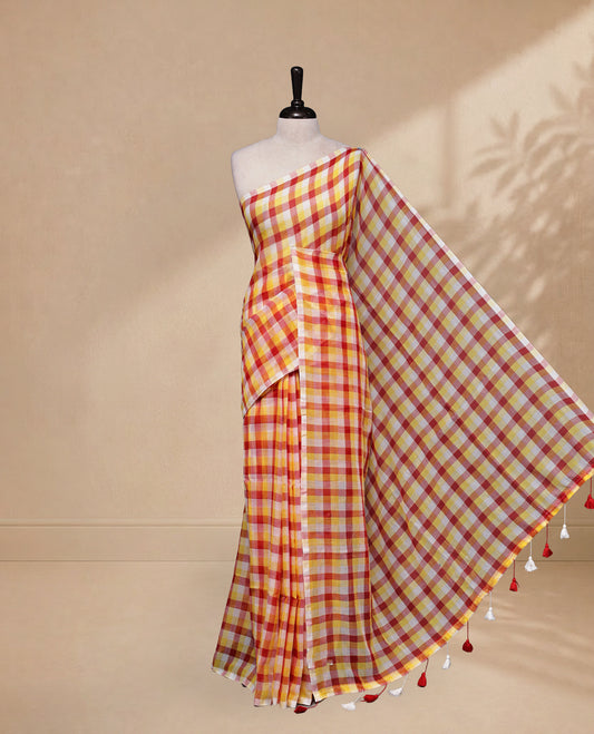 Yellow & Red colour Khadi Mul cotton saree featuring Check Pattern on body,Enhanced Minimalist Borderless Finish & elegant Tassels at pallu.