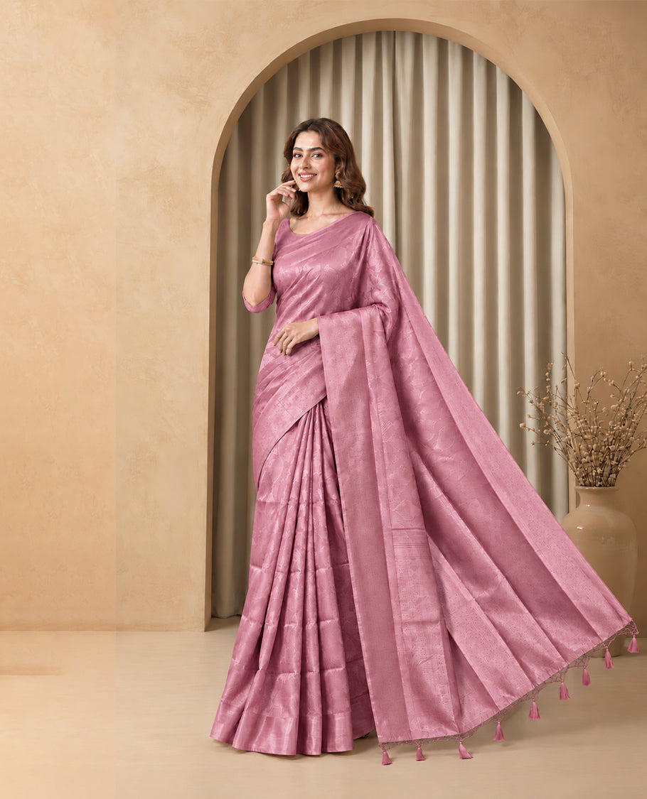 Onion Pink  Colour  Elite Soft Silk Saree with silver zari leaf motifs on the body, a self Banarasi silver zari border and brocade pallu, Paired with a blouse Piece featuring small silver zari buttas.