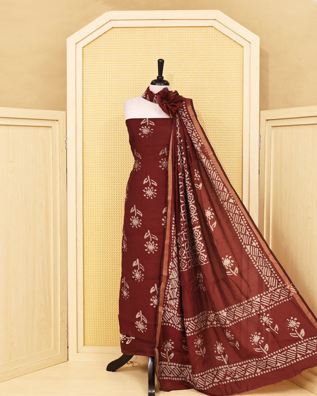 Maroon colour Chanderi Salwar Material with Printed body ,a matching printed bottom and a lightweight printed dupatta featuring a contrast border.