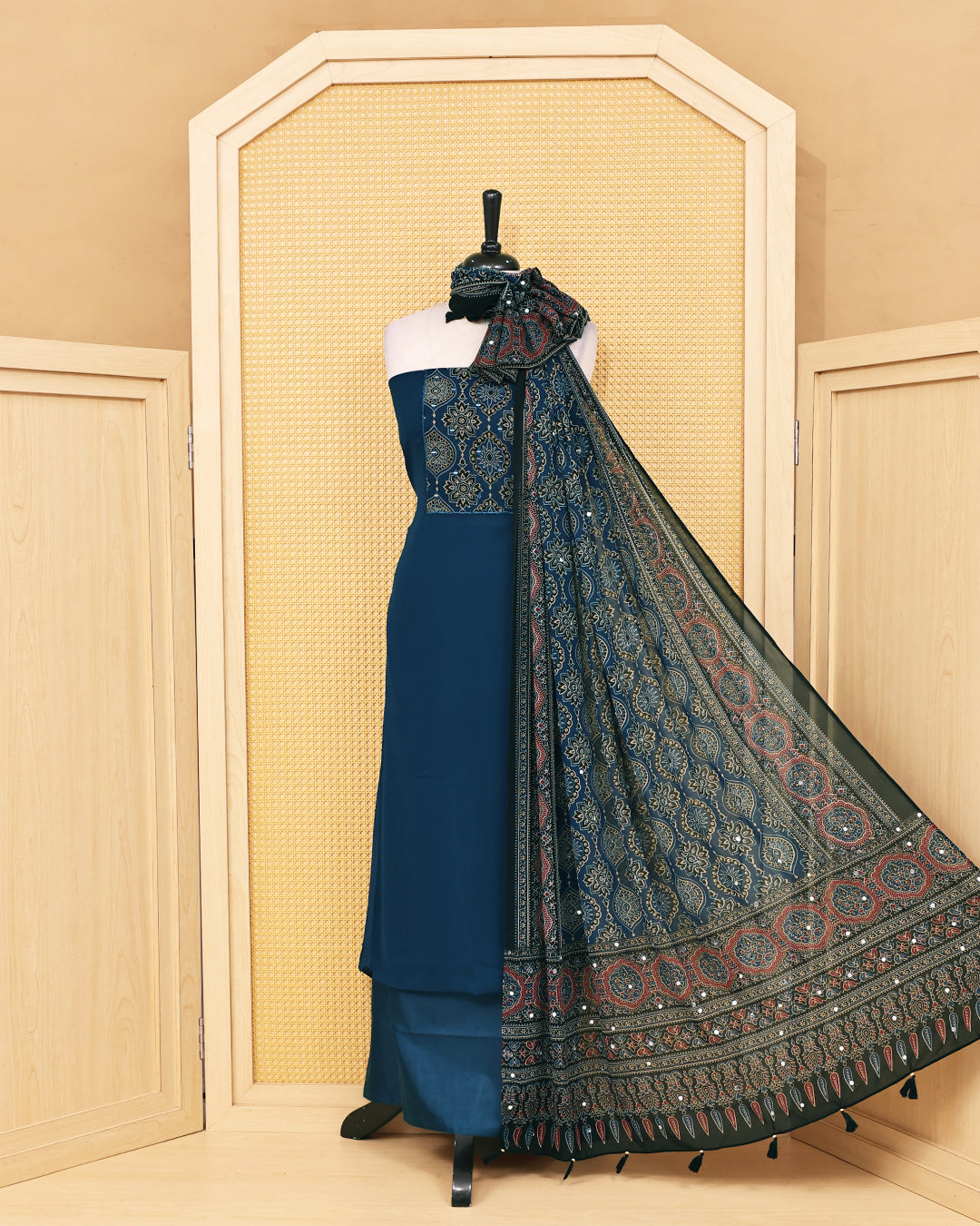 Blue colour Georgette Salwar material featuring Mirror with Design print work on body, paired with matching bottom & Dupatta.