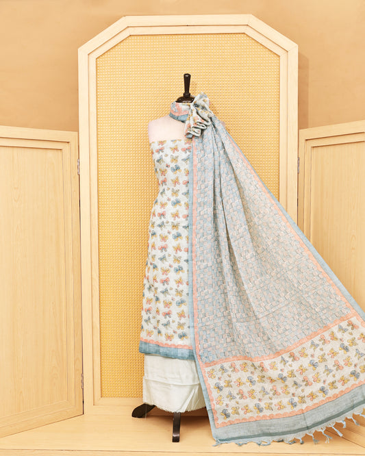Pastel blue colour linen Salwar Material featuring delightful multicolor butterfly motifs, paired with a classic white bottom and a beautifull dupatta