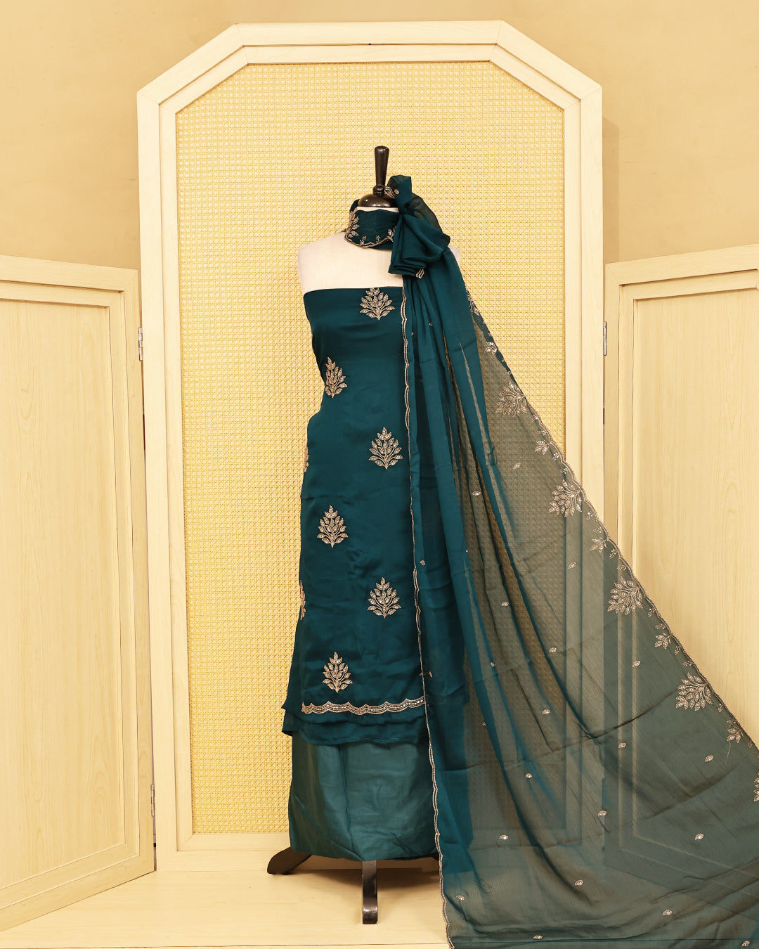 Teal colour salwar material featuring Thread with Sequin work on body, paired with matching bottom & dupatta.