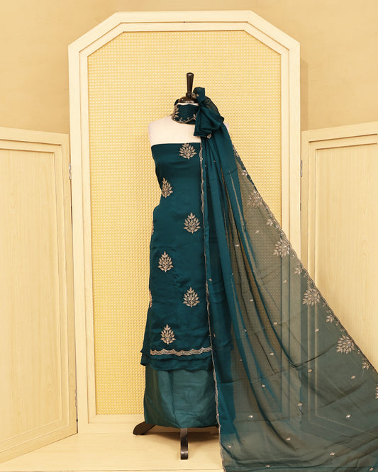 Teal colour salwar material featuring Thread with Sequin work on body, paired with matching bottom & dupatta.