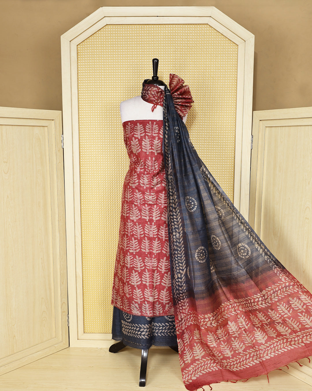 Light red colour chanderi  Salwar Material with leaf print kurta, contrast greyish blue bottom, and matching printed dupatta.