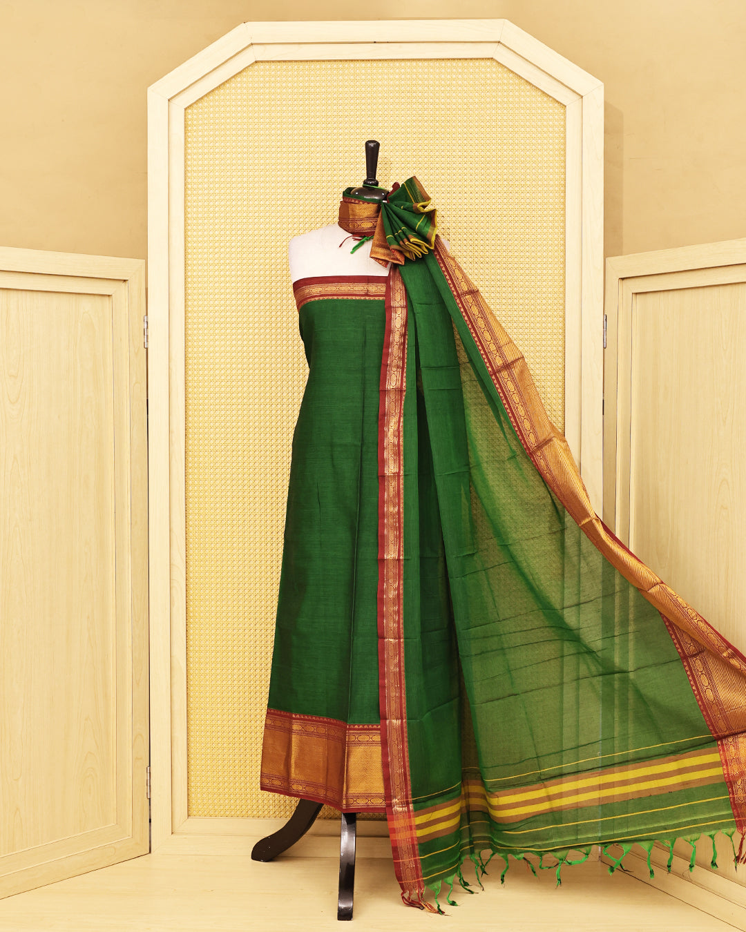 Green colour chettinad Salwar Material with rich contrast zari borders and a matching dupatta, perfect for festive and traditional wear.