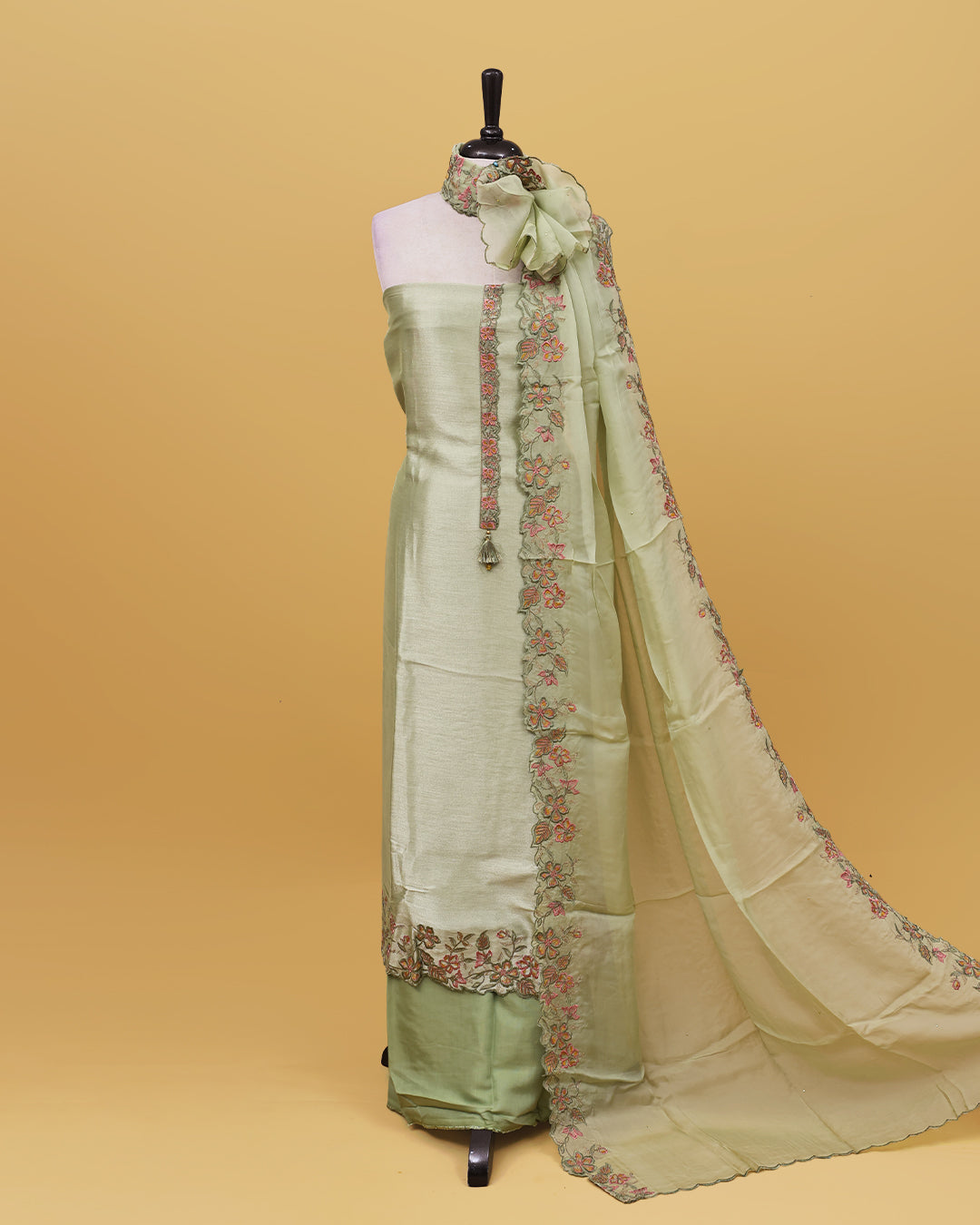 Pastel Green colour Organza Salwar material with Thread work on body, matching bottom & Dupatta.