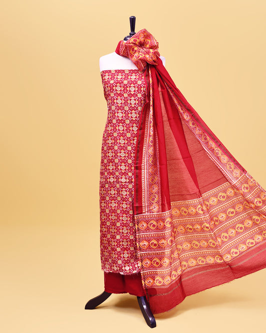 Red colour Salwar material with Geometric pattern print on body, matching bottom & Dupatta.