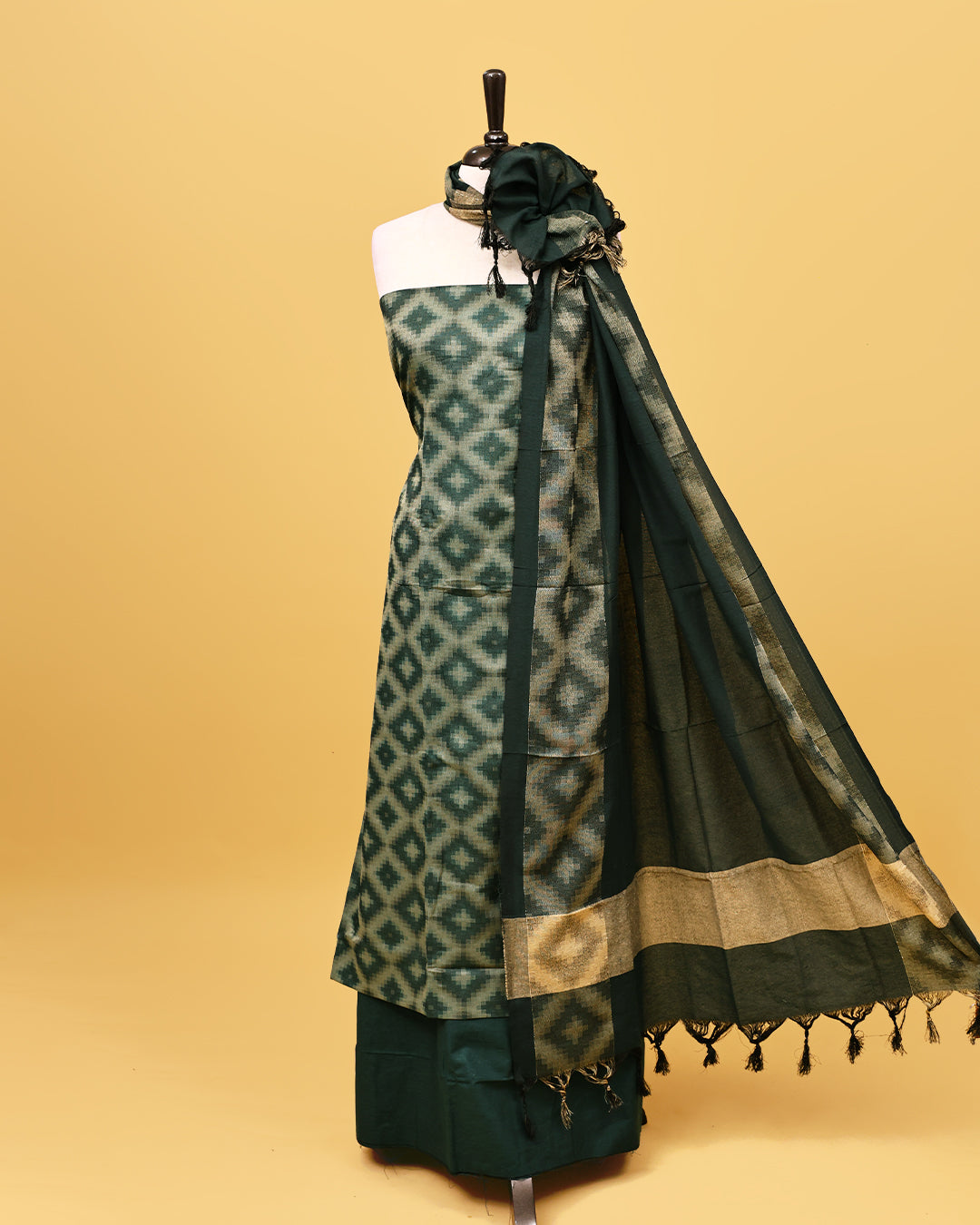 Green colour Net cotton Salwar material with Geometric pattern work on body, matching bottom & Dupatta.