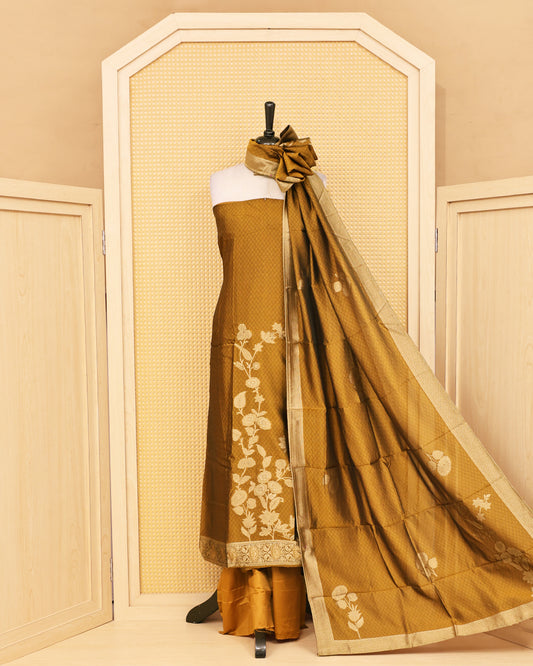Golden Olive colour Banaras salwar material featuring Zari floral work on body, paired with Matching bottom & dupatta.
