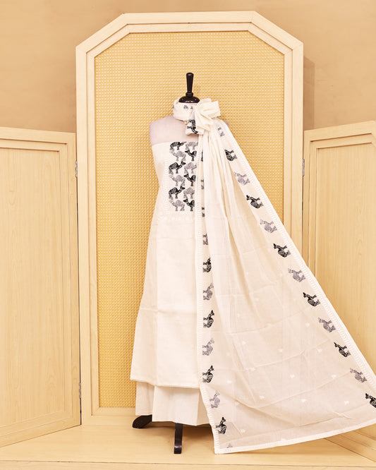 Off White colour Cotton salwar material featuring Thread Camel work on body, paired with matching bottom & dupatta.