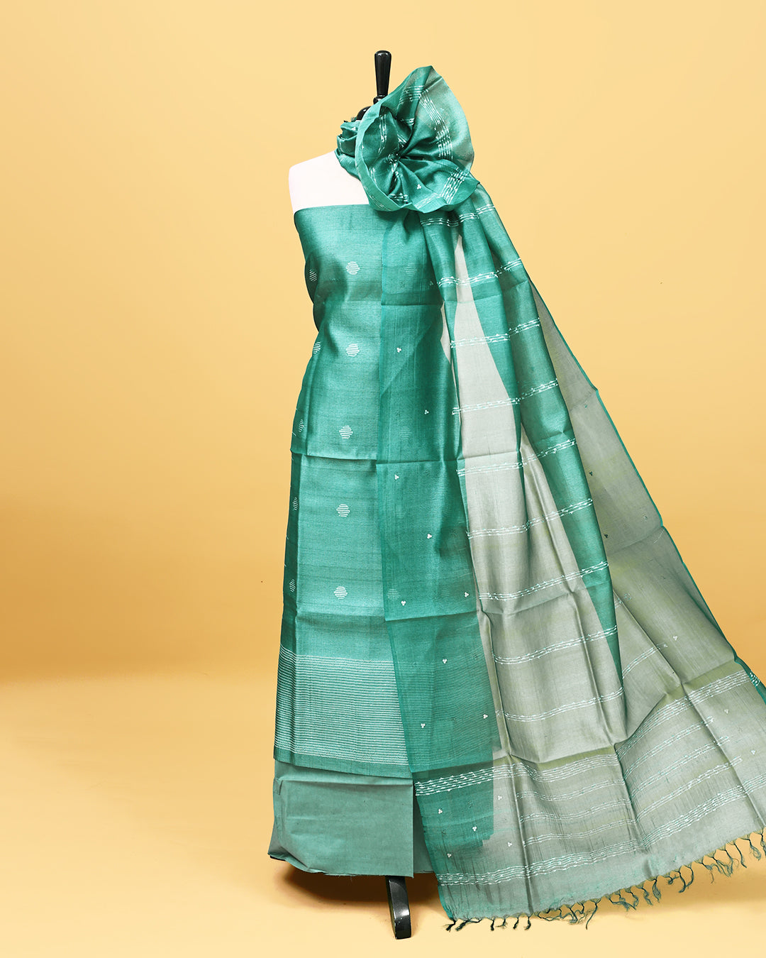 Pastel green colour Tissue Salwar material with thread work on body, matching bottom & Dupatta.