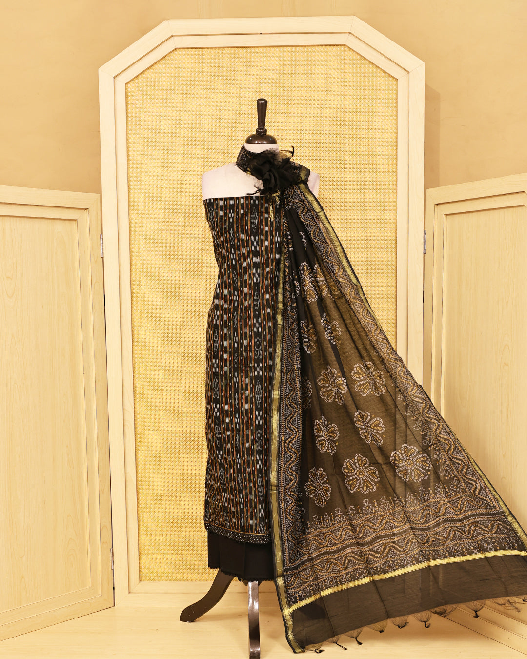 Black colour Cotton Salwar material Designed strips on body, paired with matching bottom & Dupatta.
