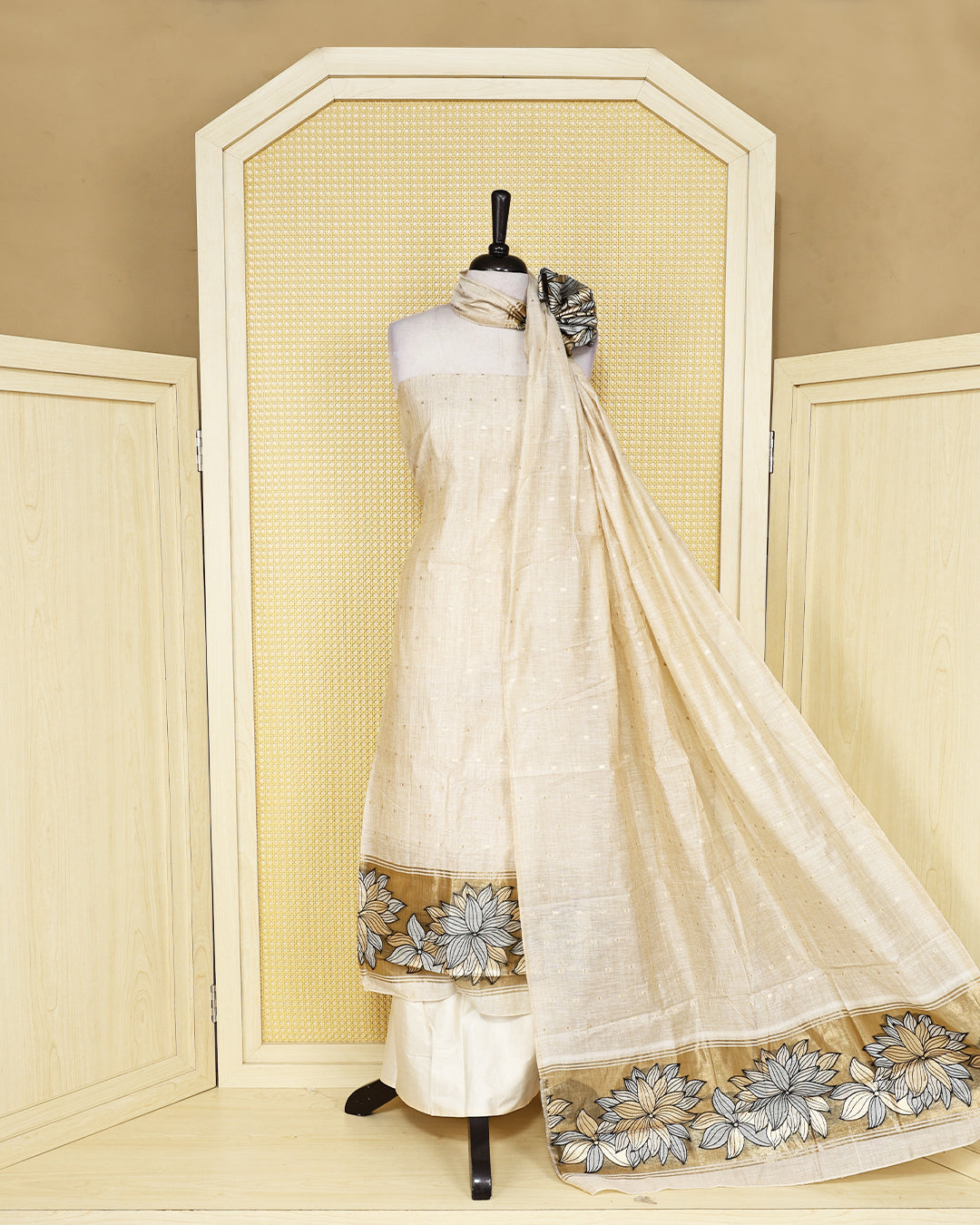Beige colour  mul chanderi Salwar Material with subtle woven detailing, matching bottom, and floral border dupatta.