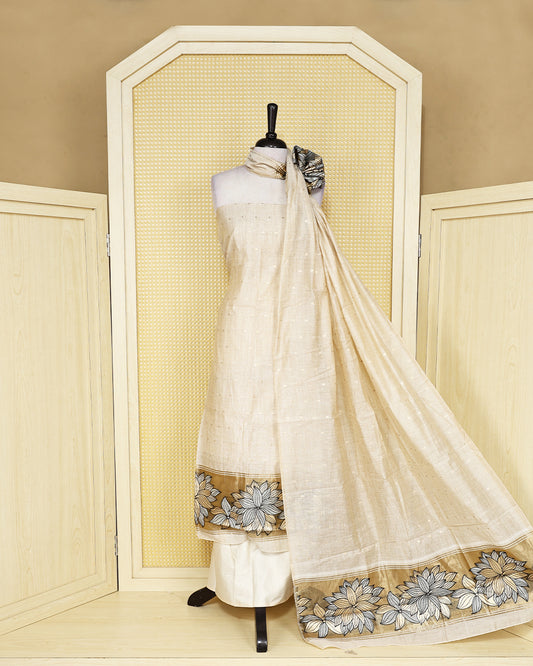 Beige colour  mul chanderi Salwar Material with subtle woven detailing, matching bottom, and floral border dupatta.
