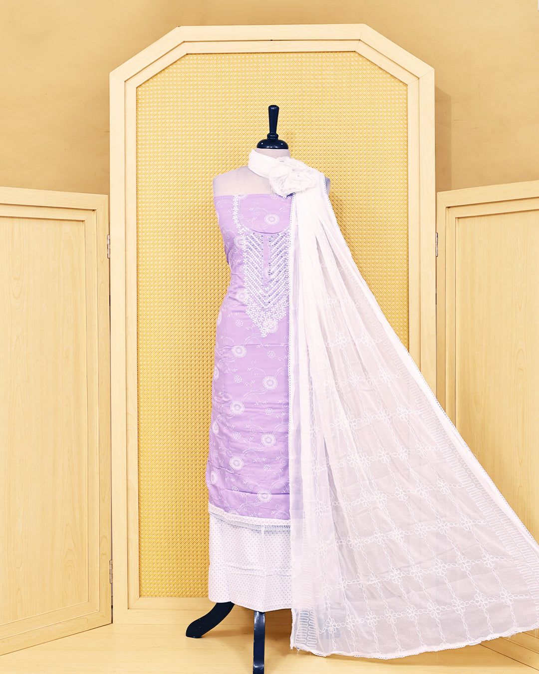 Lavender colour rayon Salwar Material with Embroidery work on body & a matching bottom an elegant white embroidered dupatta.