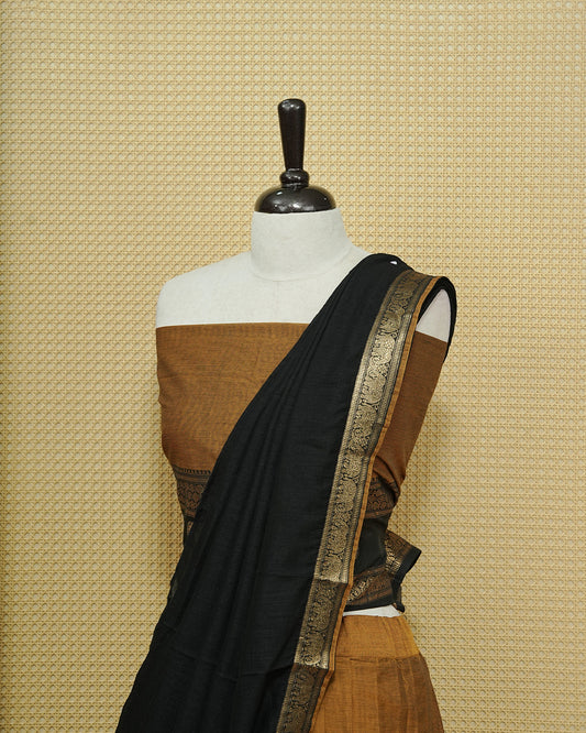 Mustard Colour chettinad cotton Semi stitched dhavani set featuring Contrast Black with Gold zari border skirt, comes with Matching blouse piece & dupatta.
