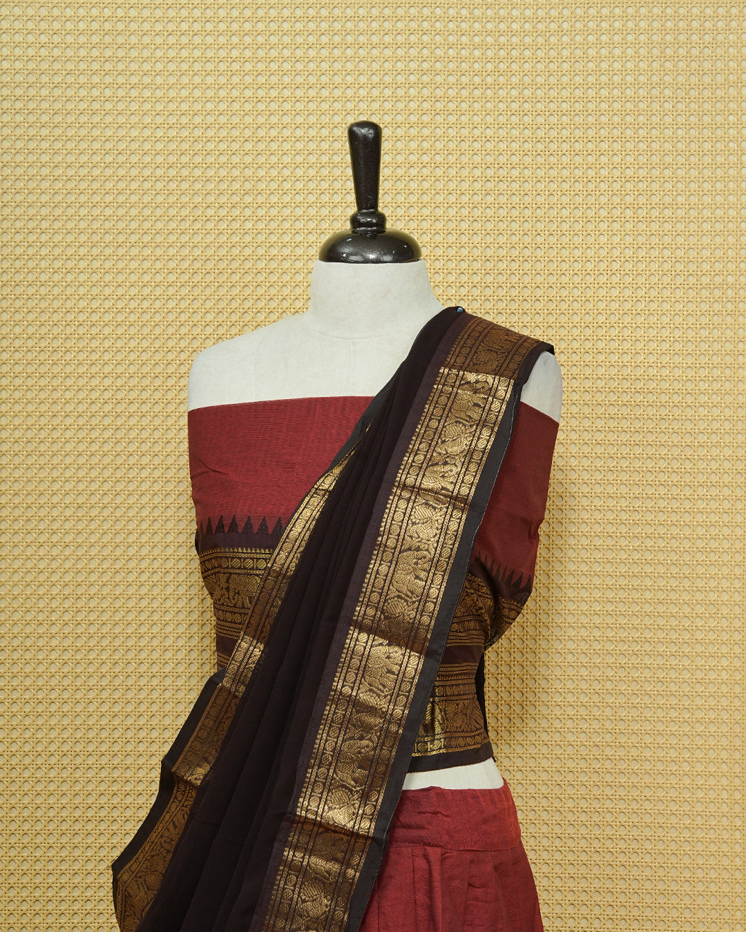 Maroon colour Chettinad Semi Stitched dhavani set Featuring contrast Black with Gold zari border on skirt, Contrast Blouse & matching dupatta.