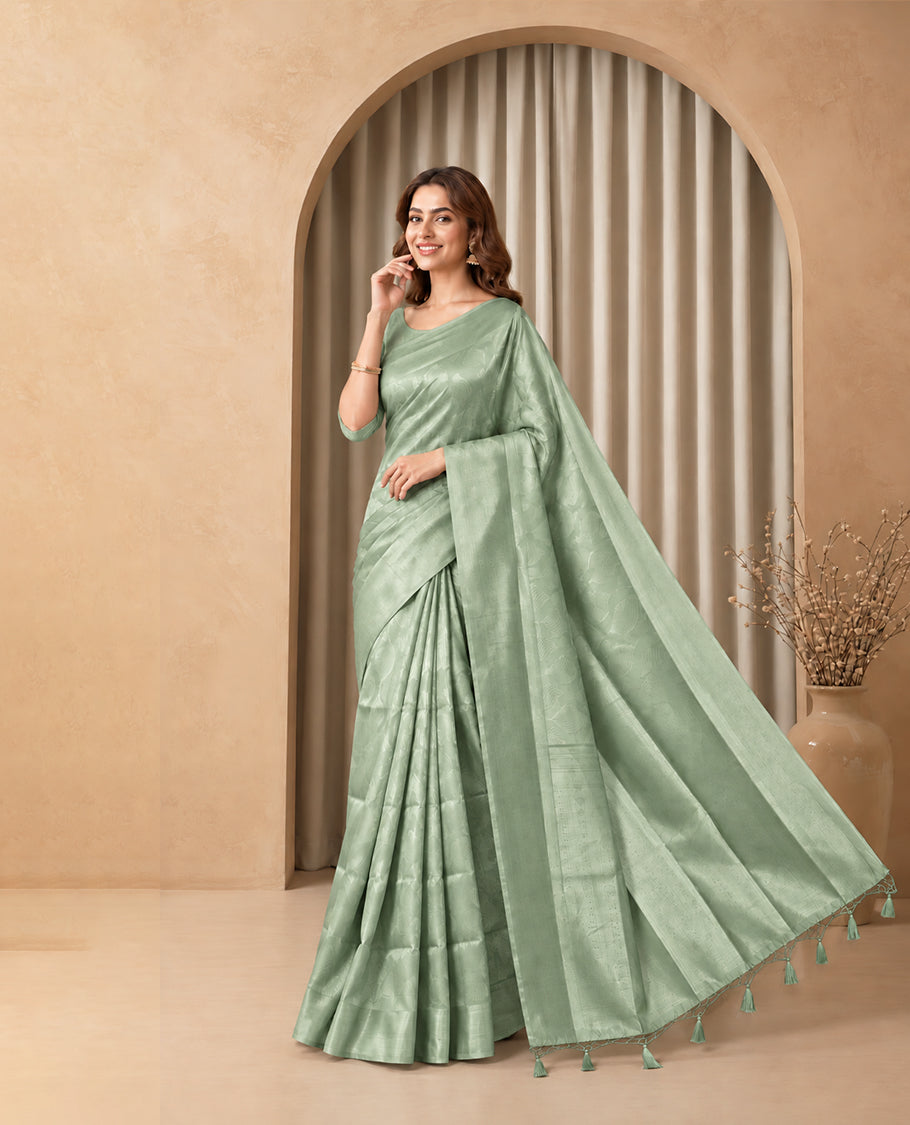 Sage Green Colour  Elite Soft Silk Saree with silver zari leaf motifs on the body, a self Banarasi silver zari border and brocade pallu, Paired with a blouse Piece featuring small silver zari buttas.