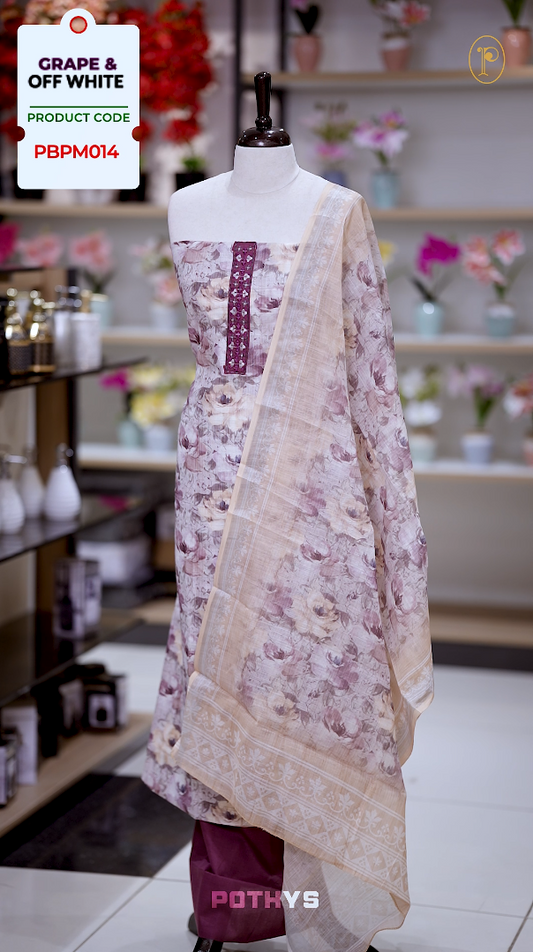 Off white colour jute cotton salwar material with grape colour leaf prints, featuring embroidery and mirror work on the neckline, paired with a printed dupatta and a contrast grape colour bottom for a graceful and elegant look.