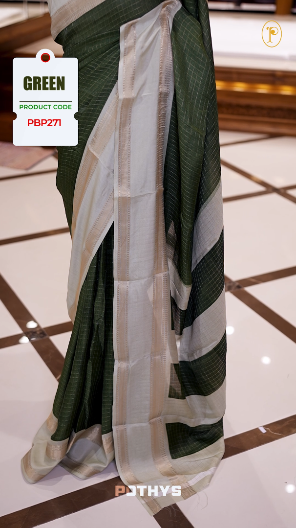 Deep Green colour saree featuring fine check patterns on the body, paired with a light Green zari woven border and pallu. Comes with a matching blouse piece