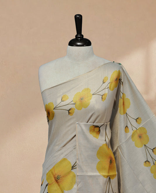 Butter Cream colour Linen Tissue Saree featuring Yellow colour small & Big floral printed border, Comes with Contrast Self Printed Blouse.