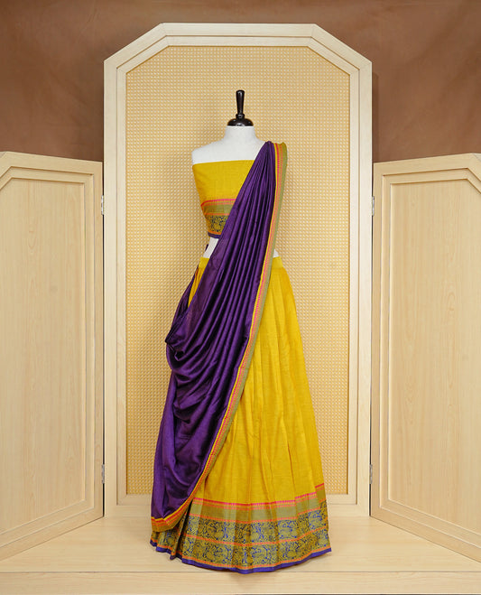 Olive colour Dhavani set Featuring Mustard Skirt and Contrast Blue colour with Zari border, paired with UnStitched Blouse & Elegant Dupatta.