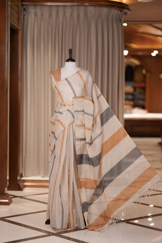 Mustard yellow & Black colour Linen printed saree featuring stylish fancy line prints all over, paired with a contrast colour printed blouse and a beautifully designed fancy line pallu.