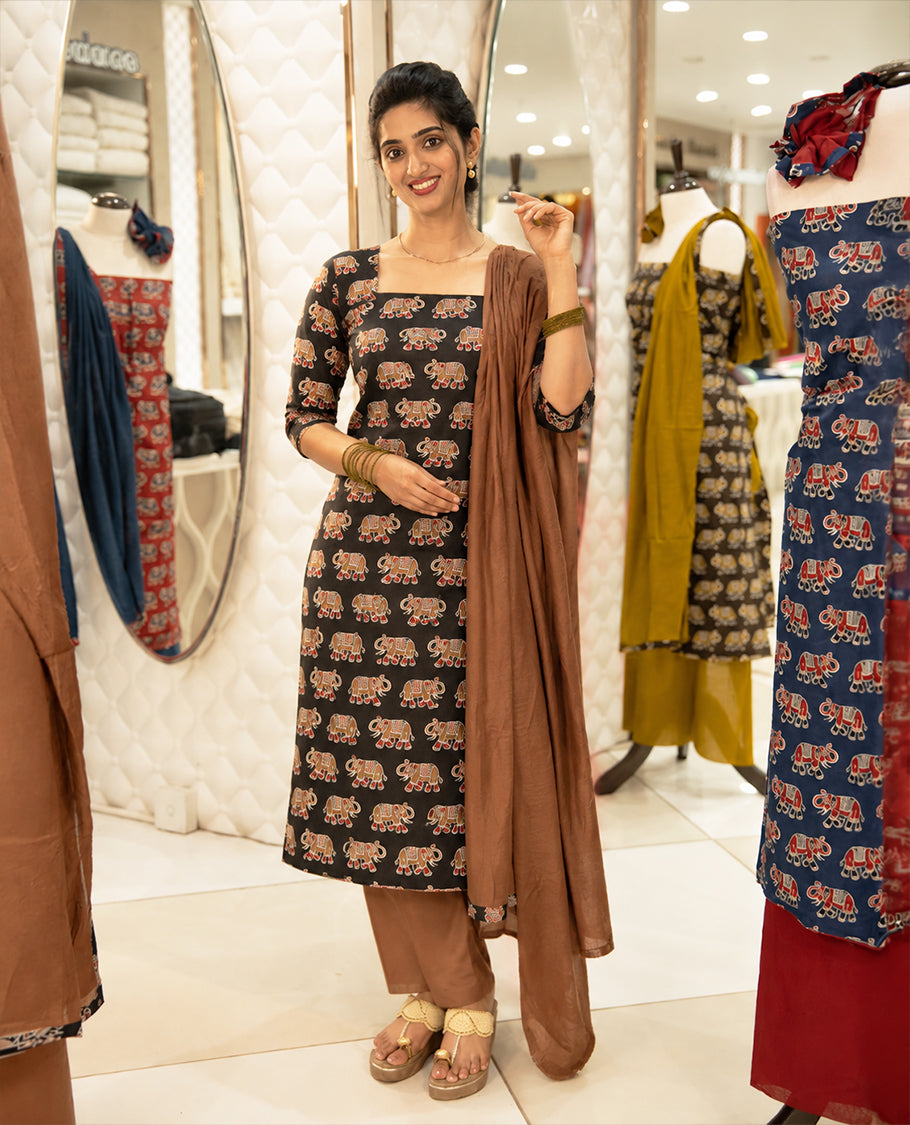 Black Colour Cotton salwar material Featuring Contrast colour Elephant motifs on body with neat piping border, paired with matching chanderi material dupatta.
