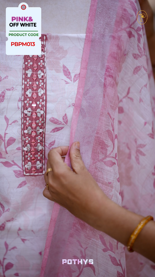 Off white colour jute cotton salwar material with pink leaf prints, featuring embroidery and mirror work on the neckline, paired with a printed dupatta and a contrast pink bottom for a graceful and elegant look.
