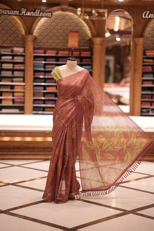 Pink & Pista green colour Semi linen tissue saree featuring full digital floral prints across the body, The saree is highlighted with a contrast floral printed pallu and comes with a plain contrasting blouse piece.