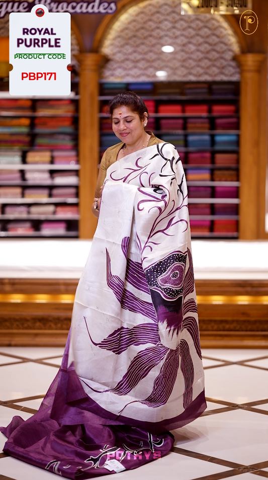Dark onion pink colour saree adorned with bold off white floral prints, blending tradition with a modern twist & paired with a matching blouse.